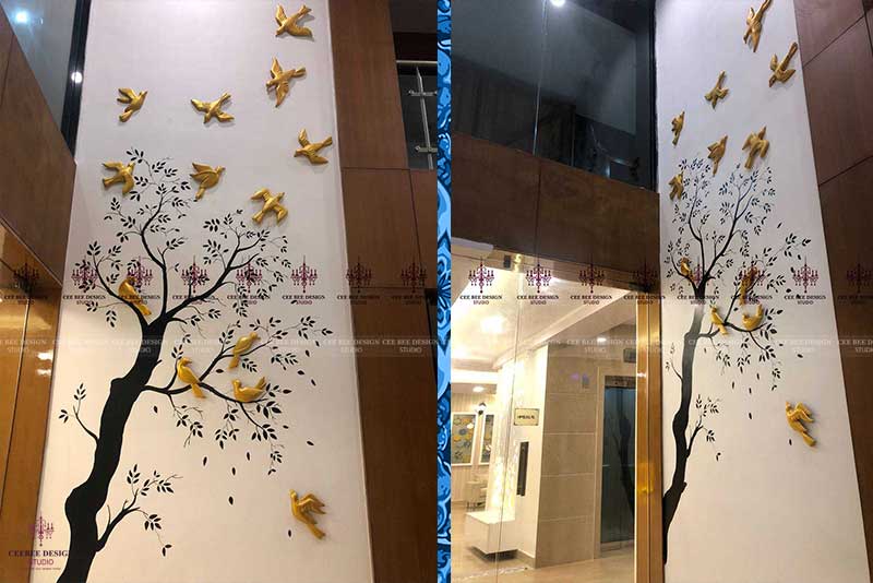 Two visuals of a tree populated by birds, reflecting the integration of natural elements in modern interior design.