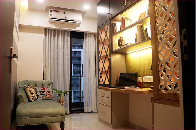 An intimate space with a chic desk and chair, exemplifying the luxury interior design aesthetic prevalent in Bangalore.