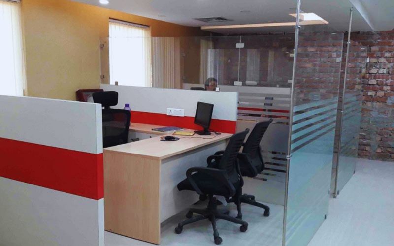 Office space for rent in Bangalore, designed by commercial interior designers, showcasing a modern and professional environment.