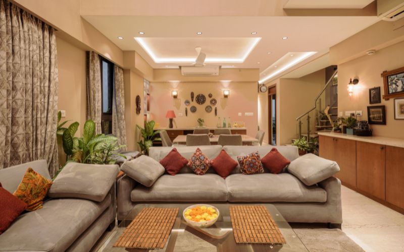 A cozy living room showcasing comfortable couches and a chic coffee table, crafted by top interior decorators in Kolkata.