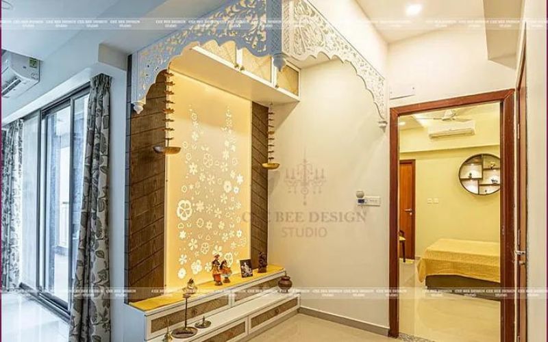 Wooden door and decorative wall in a beautifully designed puja room.