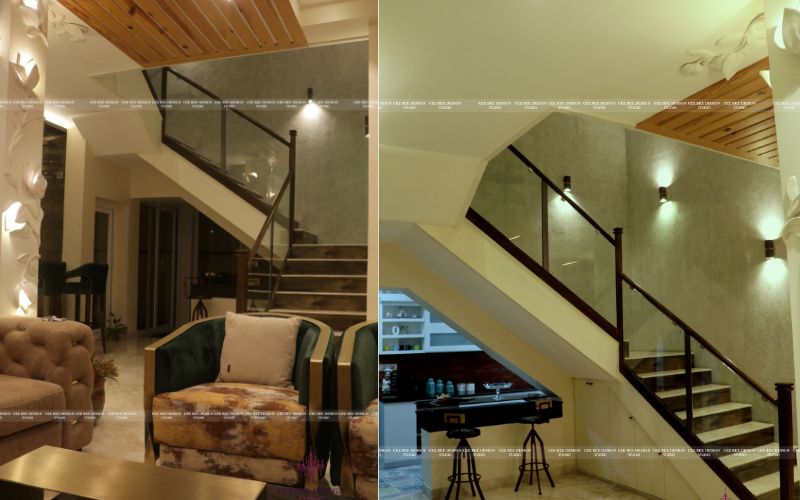 Luxury bungalow living room with stylish stairs, reflecting the expertise of an interior designer based in Bangalore, emphasizing sophistication.