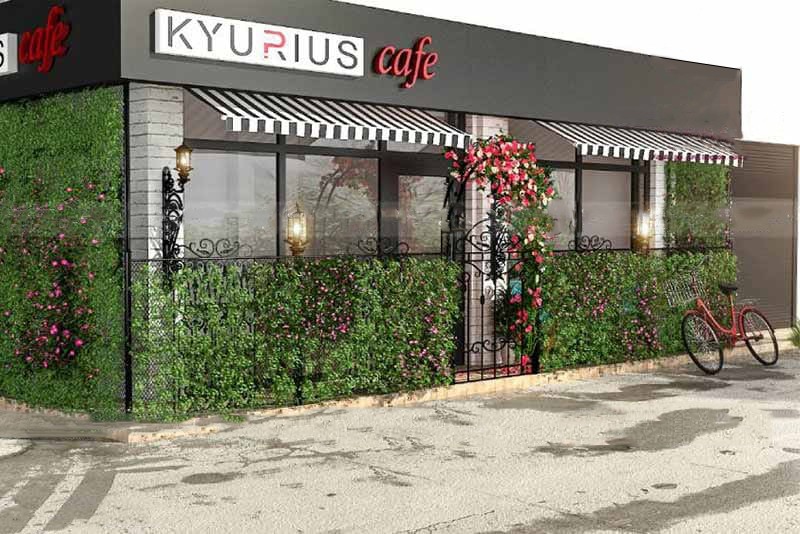 Exterior of a cafe in Bangalore with a bicycle parked outside.