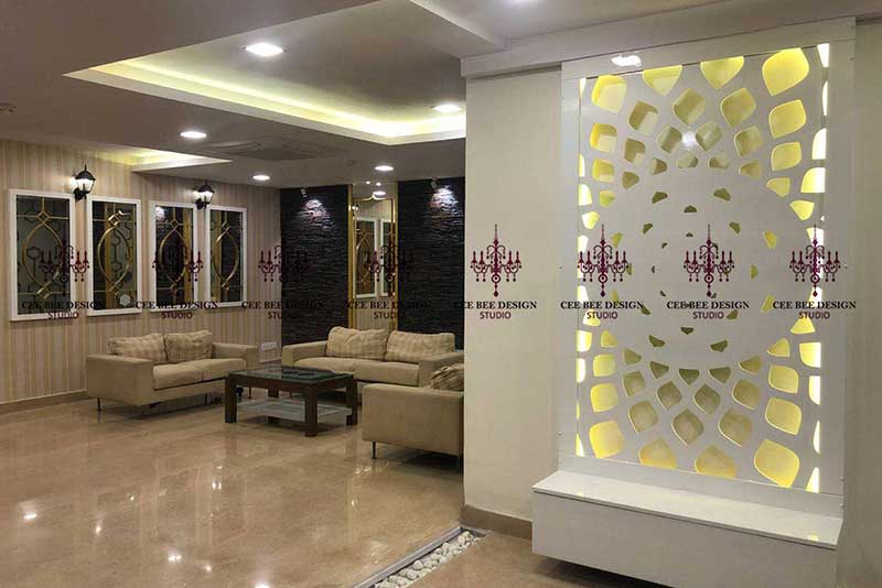 Stylish reception area with an expansive wall, designed by leading interior designers in Bangalore.