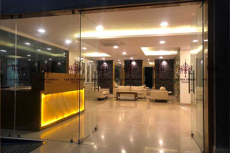 Sophisticated reception area of a hotel, designed by top interior designers in Bangalore, highlighting contemporary aesthetics.